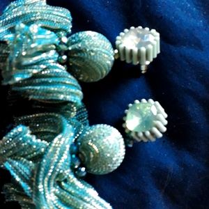 Blue-green with gold/silver sparkled knit earrings.
